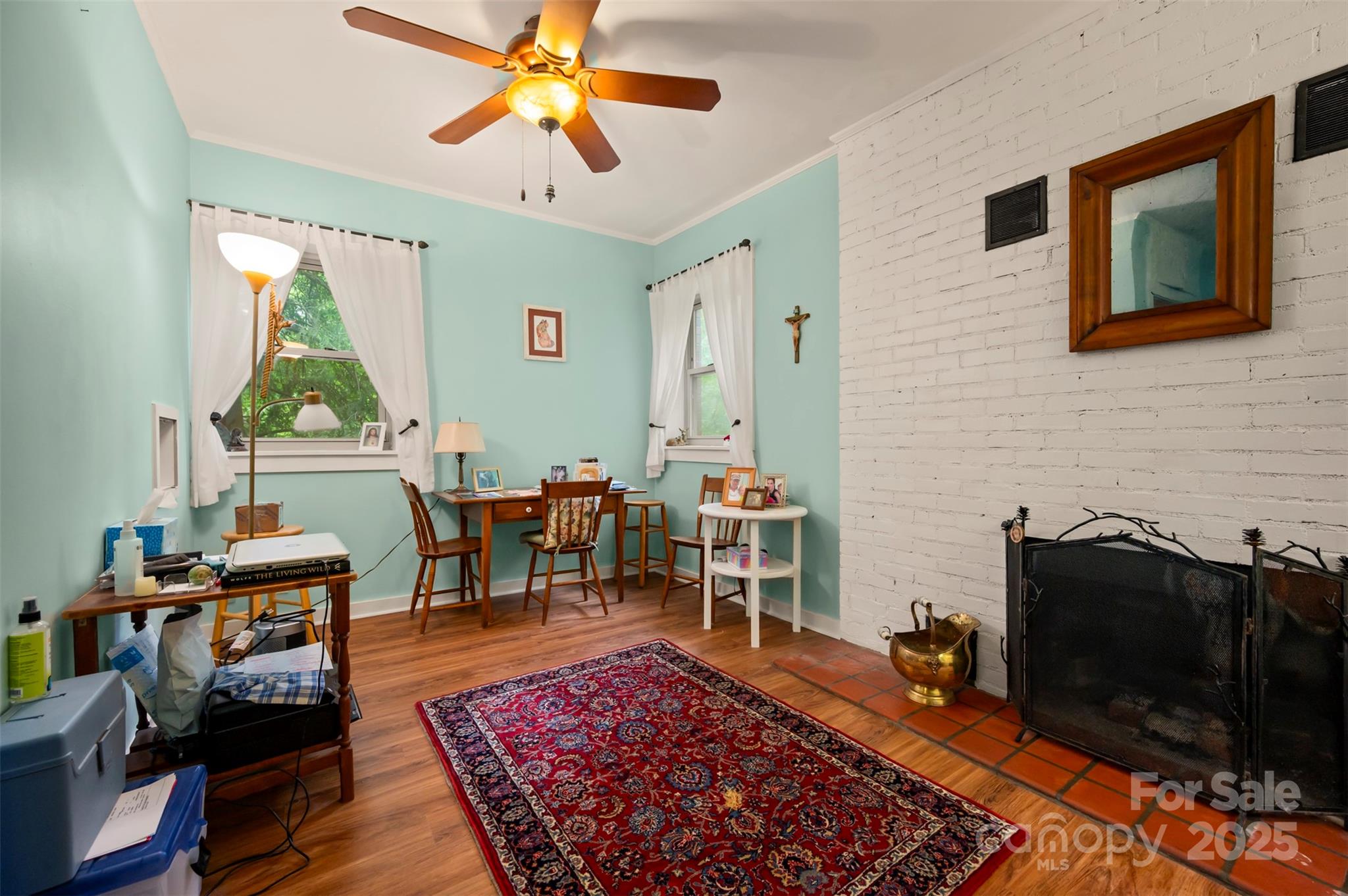 312 Page Farm Road Tryon, NC 28782 - Photo 22 of 44 a living room with furniture a rug and a fireplace