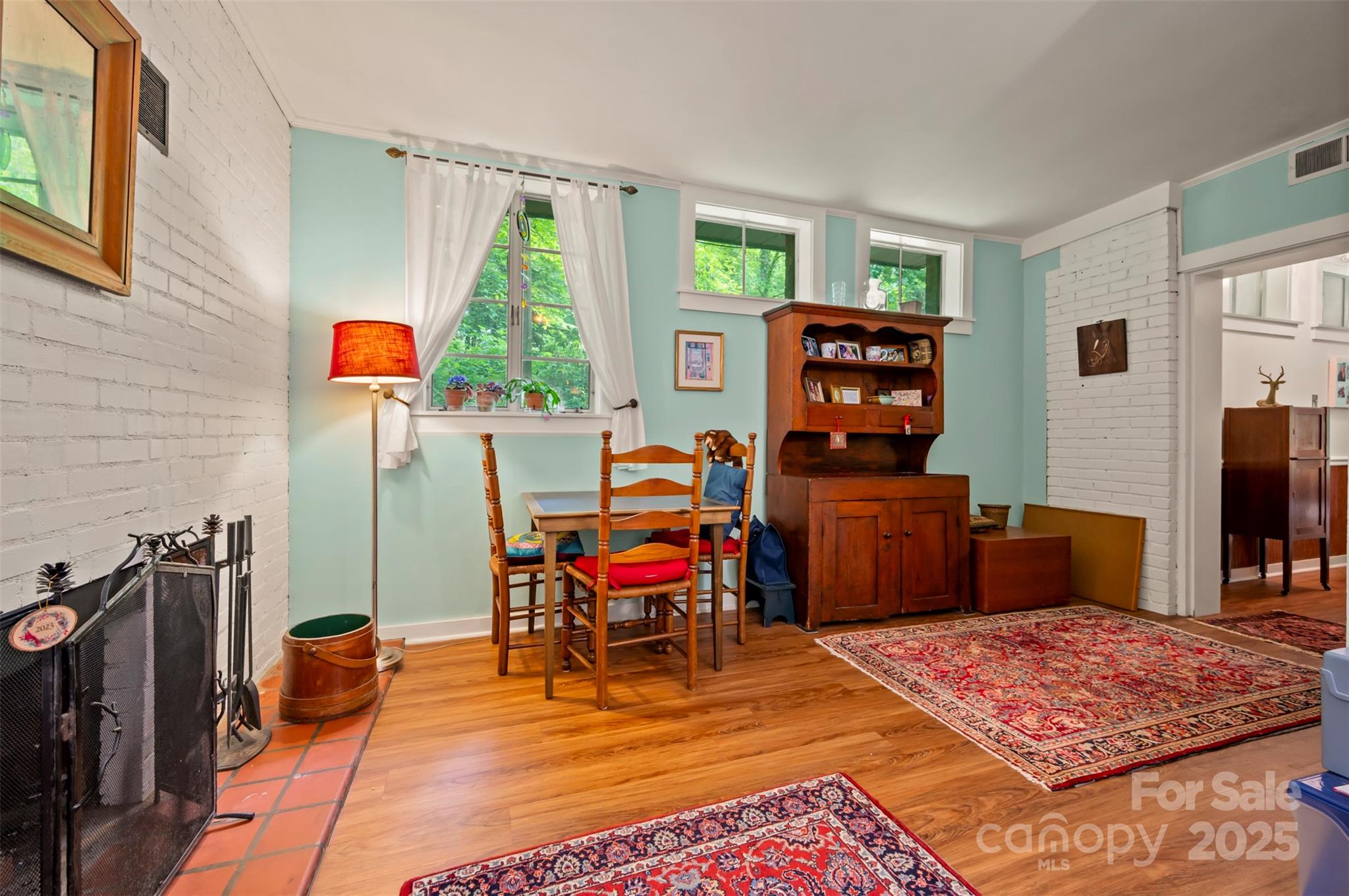 312 Page Farm Road Tryon, NC 28782 - Photo 23 of 44 a room with furniture a rug and a flat screen tv