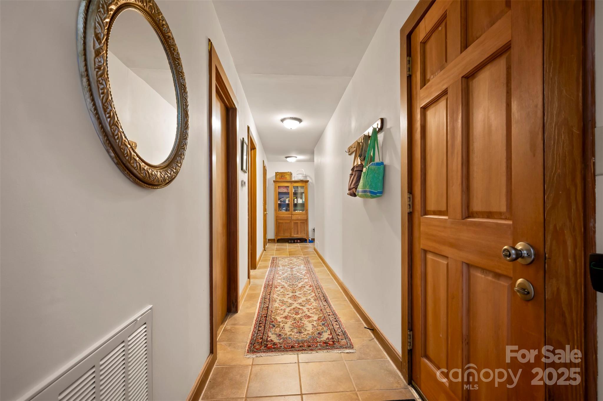 312 Page Farm Road Tryon, NC 28782 - Photo 24 of 44 a very nice looking room with a large mirror and a wooden floor