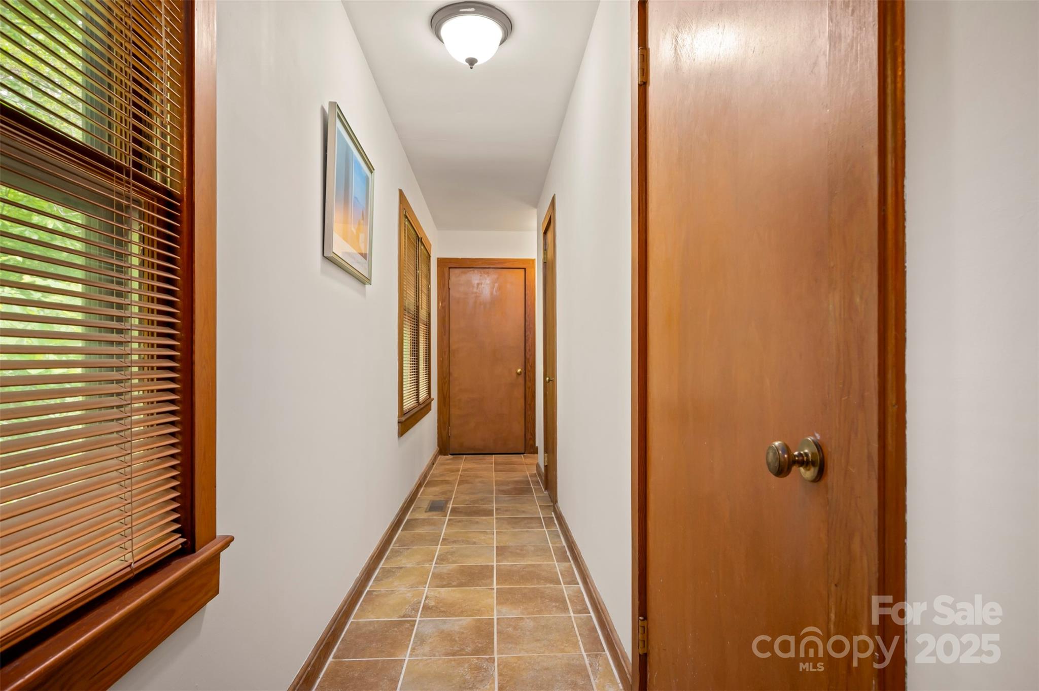 312 Page Farm Road Tryon, NC 28782 - Photo 29 of 44 a view of a hallway with wooden floor and closet
