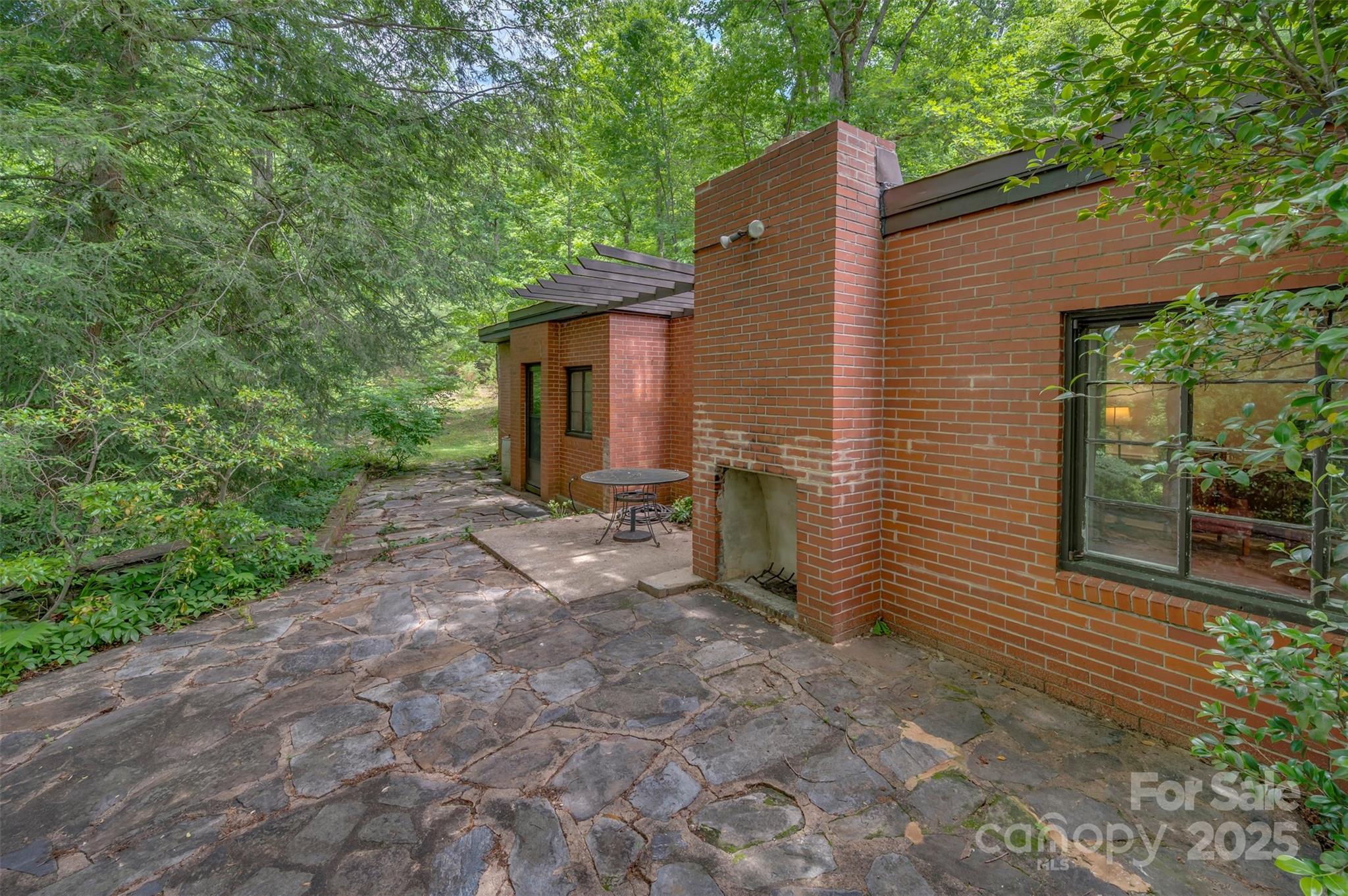 312 Page Farm Road Tryon, NC 28782 - Photo 33 of 44 a view of a house with a yard