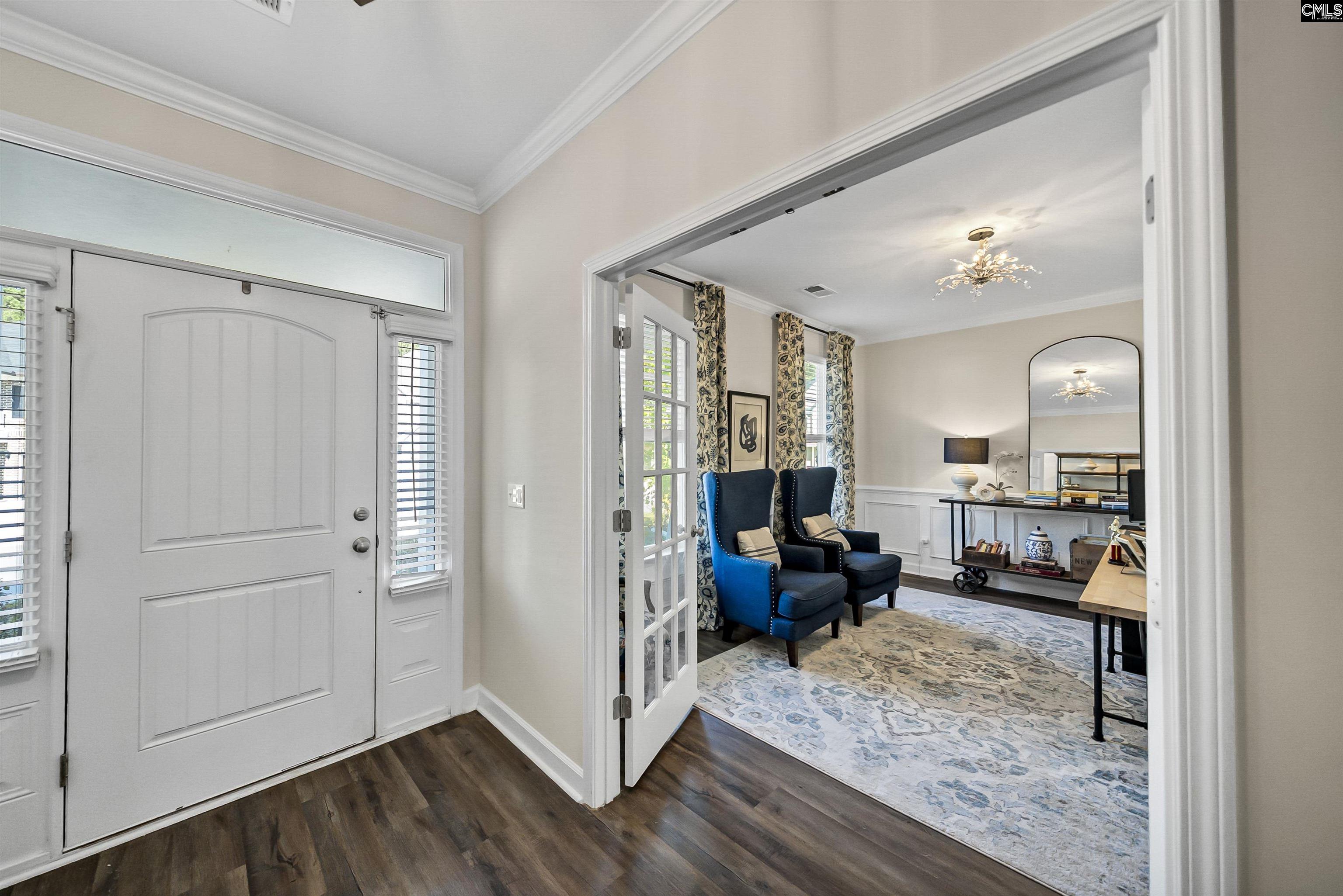 515 Malachite Lane Chapin, SC 29036 - Photo 17 of 63 a living room with furniture and a wooden floor
