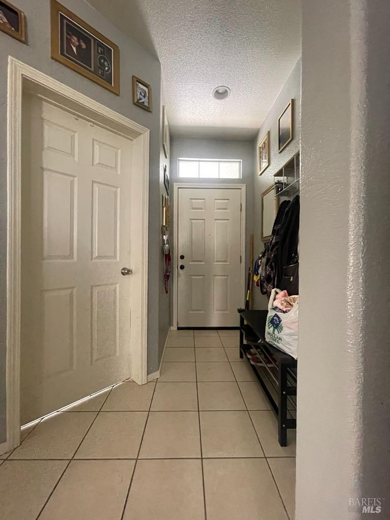 2507 Winterhaven Avenue Santa Rosa, CA 95404 - Photo 22 of 27 a view of a hallway to rooms