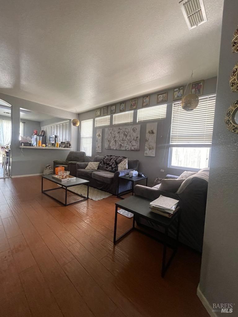 2507 Winterhaven Avenue Santa Rosa, CA 95404 - Photo 6 of 27 a living room with furniture and a potted plant