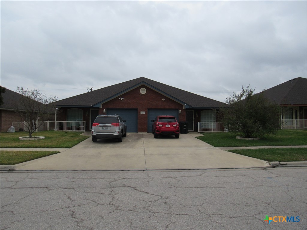 a car parked in front of a house