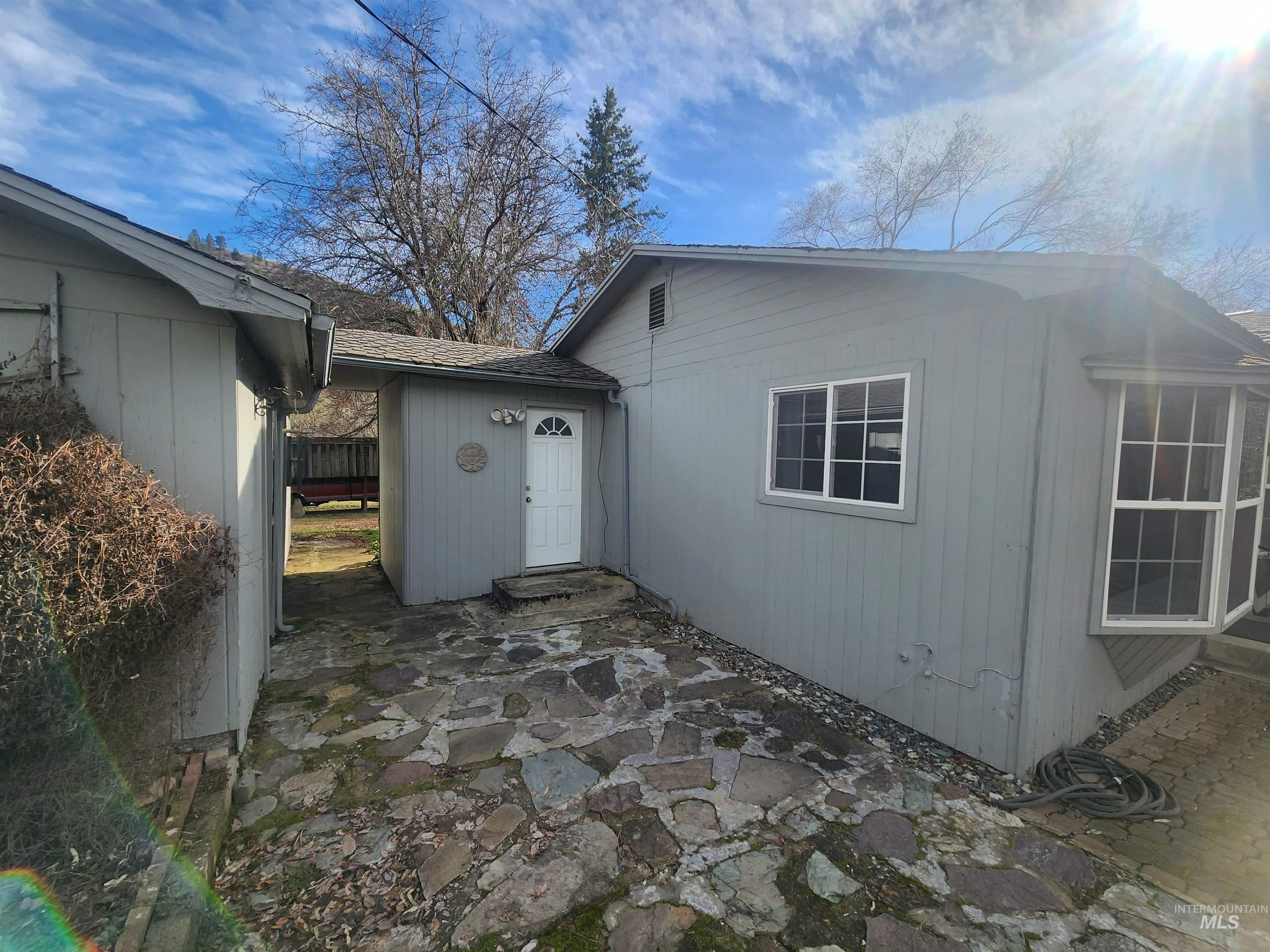 196 Main Street Juliaetta, ID 83535 - Photo 22 of 27 View of property exterior featuring a patio area