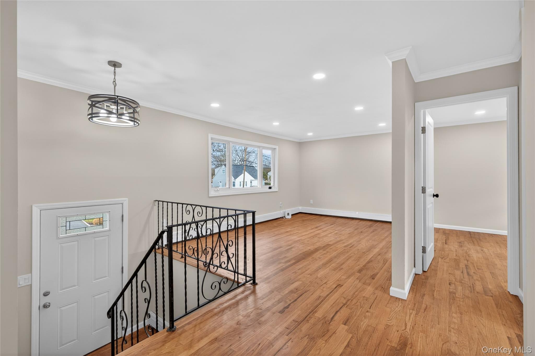 15 Lindsay Street Huntington, NY 11743 - Photo 6 of 23 a view of a hallway with wooden floor
