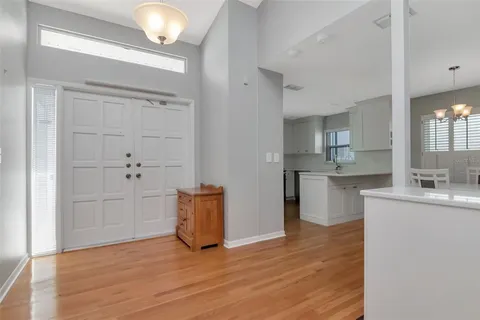 a view of kitchen with wooden floor