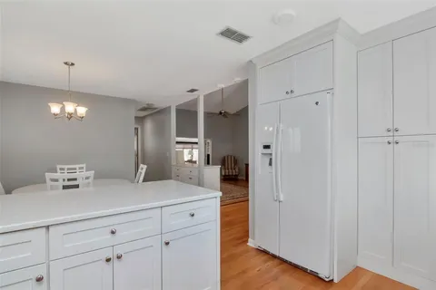 a bathroom with a double vanity sink and mirror