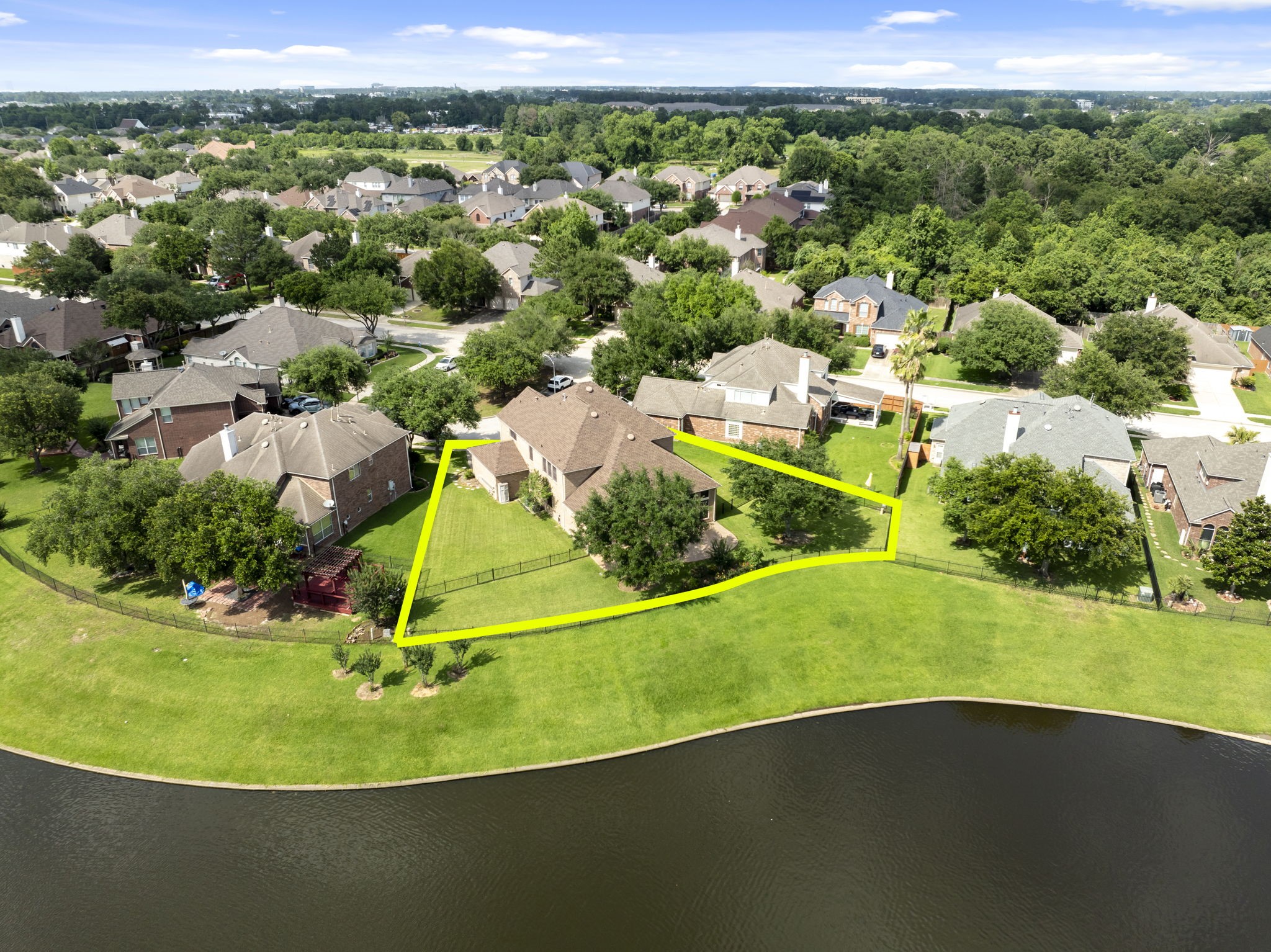 2907 Stemwood Drive Spring, TX 77388 - Photo 33 of 33 Bird’s-eye view highlights the home’s impressive oversized waterfront lot with expansive green space, mature trees, and a desirable setting backing to the lake for added privacy and scenic views.