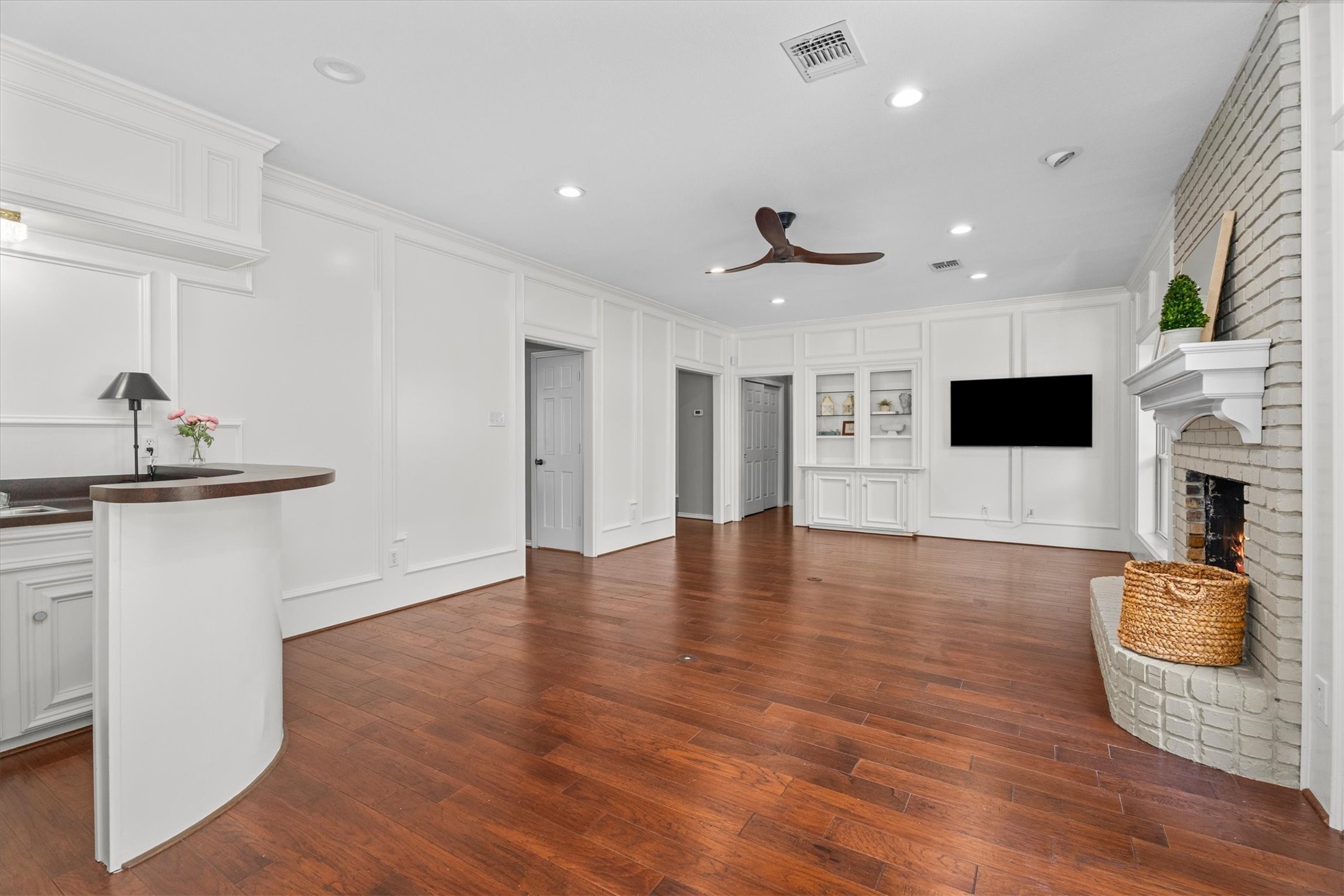 16267 Salmon Lane Spring, TX 77379 - Photo 18 of 48 The family room also features built-in cabinets and shelves and a mounted TV on the opposite side (TV coveys). Use the wet bar to showcase your barware, as a coffee bar, or to hide your Amazon boxes!