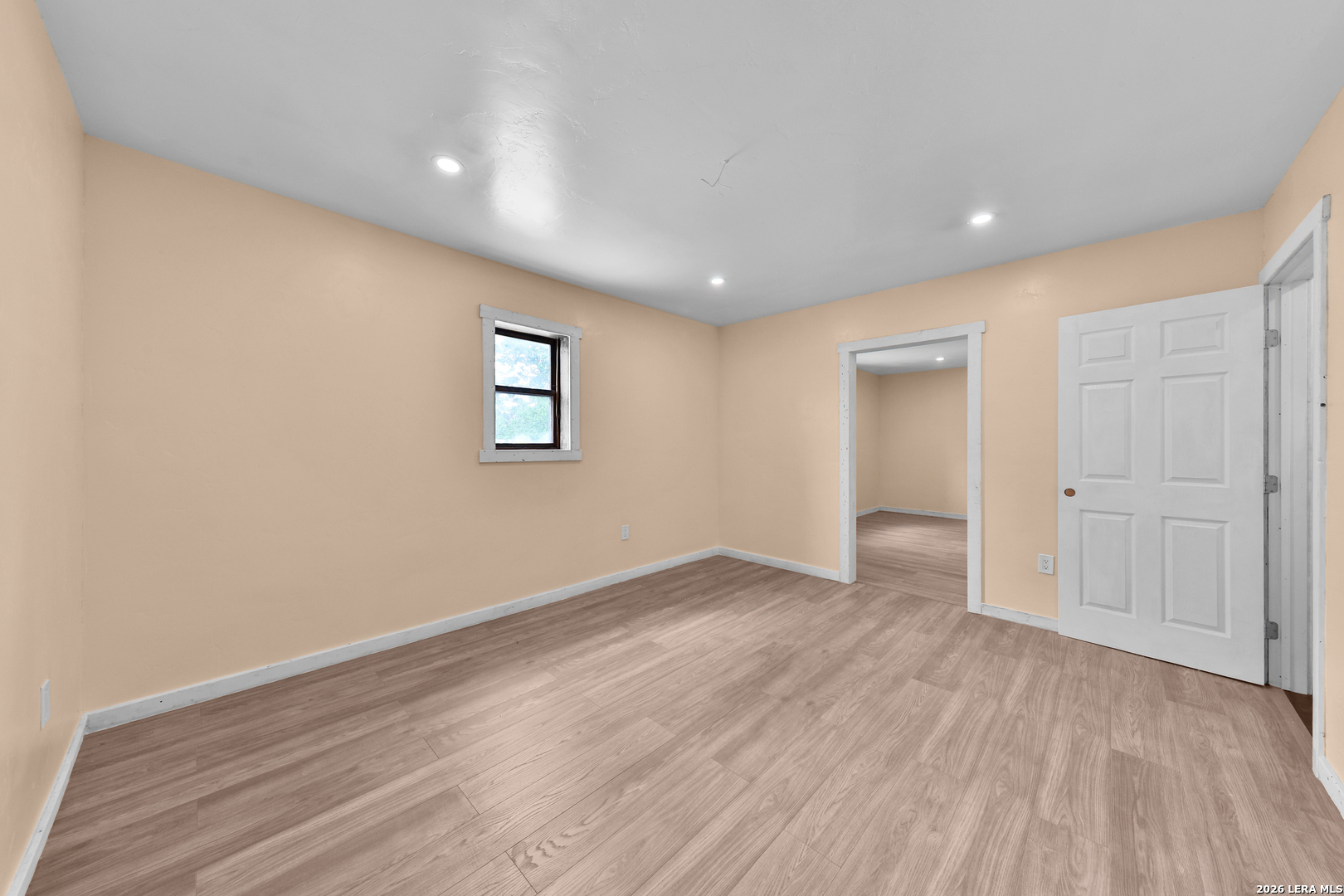 122 Brink Center Point, TX 78010 - Photo 26 of 40 an empty room with wooden floor and windows