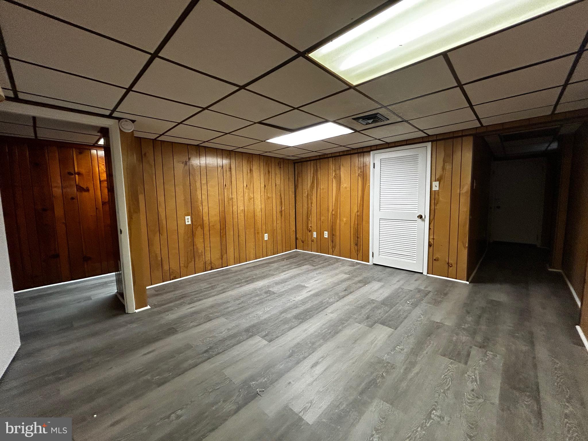 762 East High Street, Unit 3 Pottstown, PA 19464 - Photo 15 of 19 a view of an empty room with wooden walls