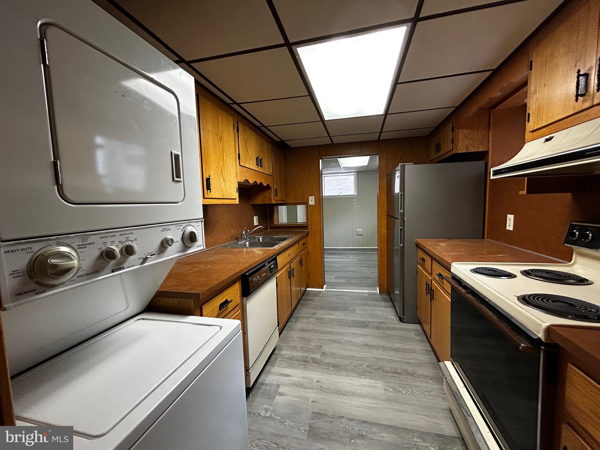 762 East High Street, Unit 3 Pottstown, PA 19464 - Photo 4 of 19 a kitchen with stainless steel appliances granite countertop a sink a stove and a refrigerator