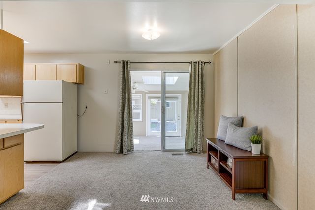 a room with furniture and a window