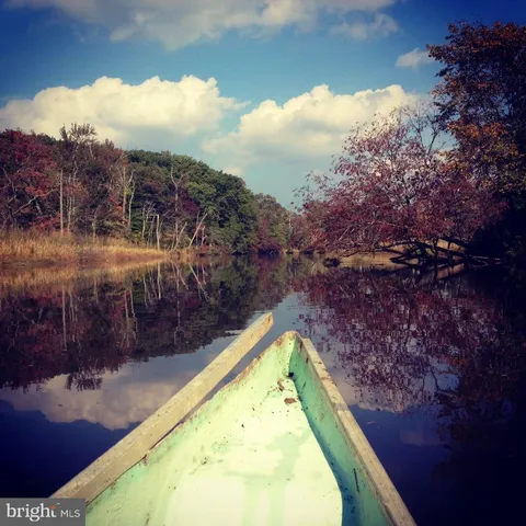 a view of a lake from a balcony