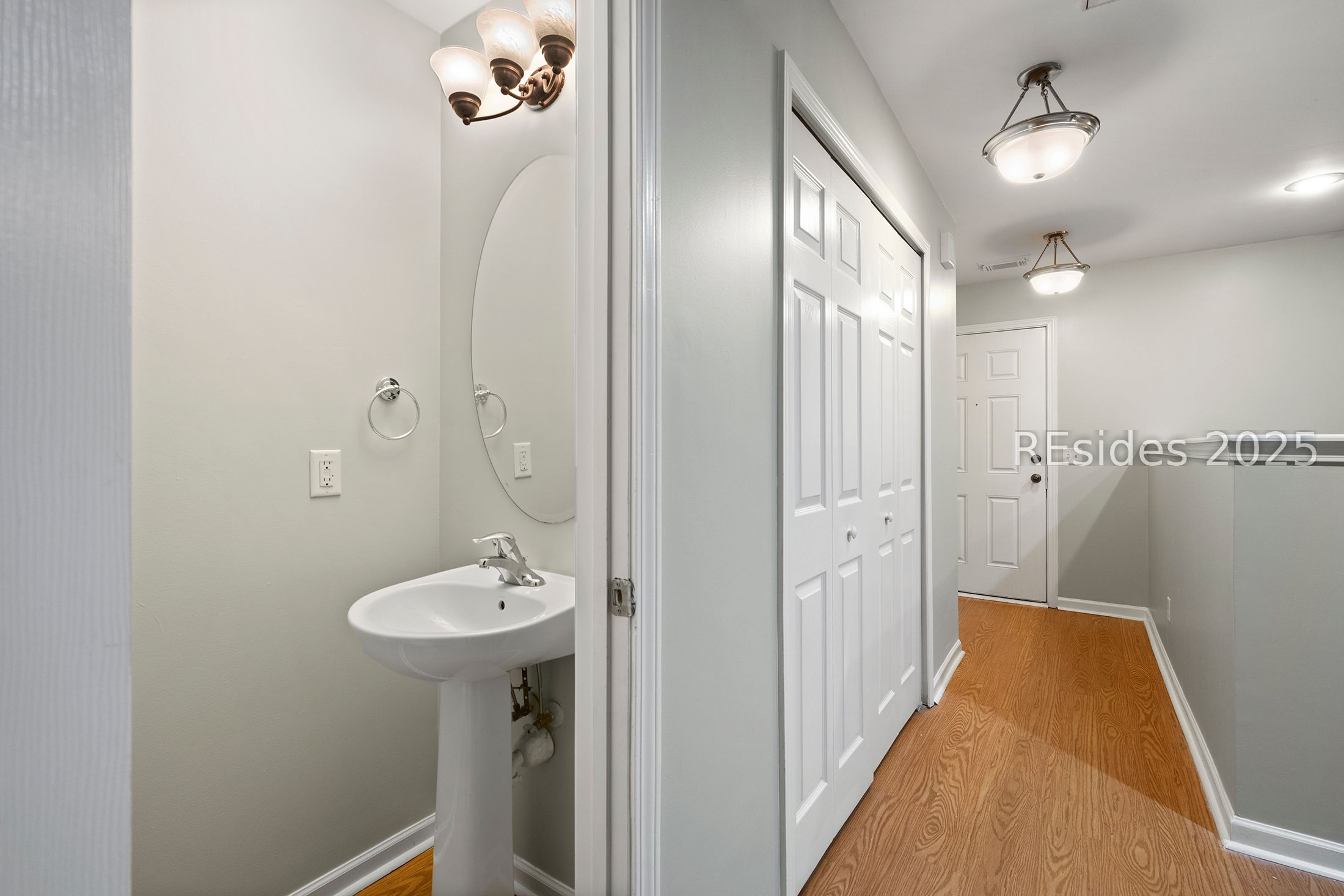 307 East Avenue Bluffton, SC 29910 - Photo 21 of 36 Hall way from front door to LR - kitchen to right