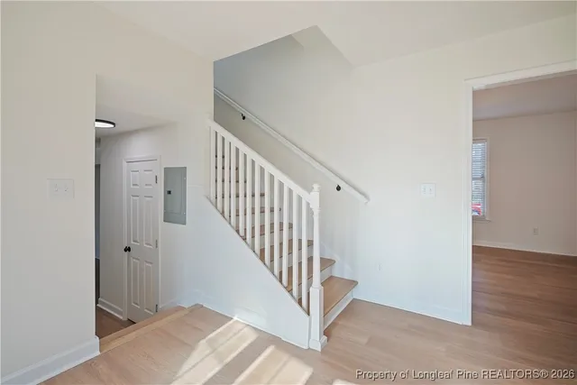a view of room with window and ceiling fan