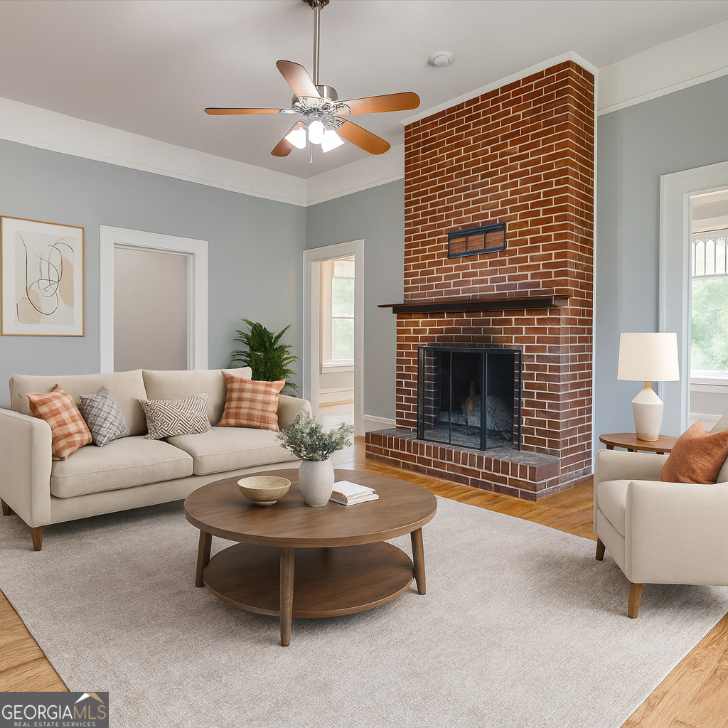 19 McDonough Street Hampton, GA 30228 - Photo 17 of 18 a living room with furniture and a fireplace
