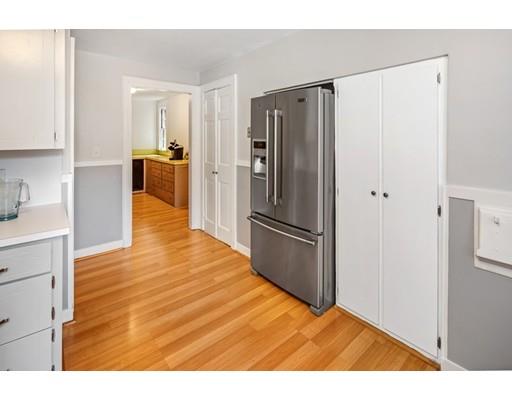 54 Sturtevant Road Quincy, MA 02169 - Photo 13 of 32 a view of a kitchen with refrigerator and wooden floor