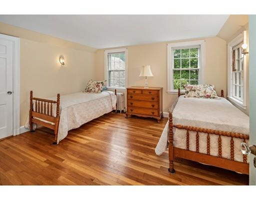 54 Sturtevant Road Quincy, MA 02169 - Photo 20 of 32 a spacious bedroom with a bed and a window
