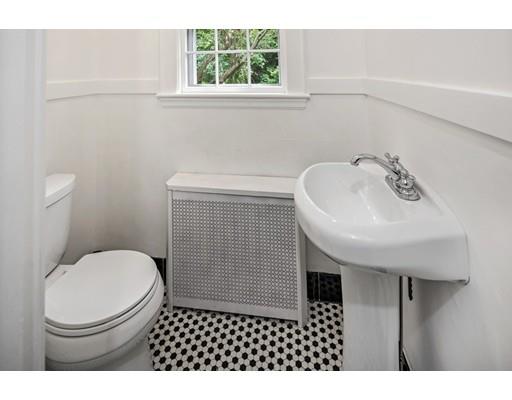 54 Sturtevant Road Quincy, MA 02169 - Photo 25 of 32 a bathroom with a sink toilet and window