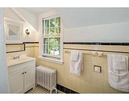 54 Sturtevant Road Quincy, MA 02169 - Photo 28 of 32 a bathroom with a sink and a mirror