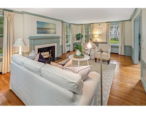 54 Sturtevant Road Quincy, MA 02169 - Photo 3 of 32 a living room with furniture and a fireplace