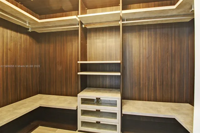 a room with a bed and a cabinet