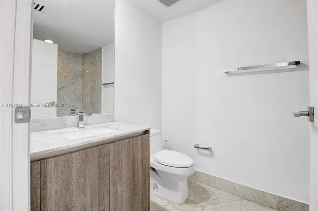a bathroom with a sink and a toilet