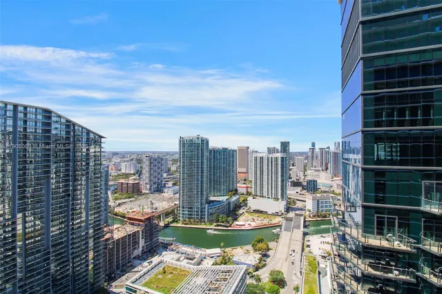 a view of a city with tall buildings