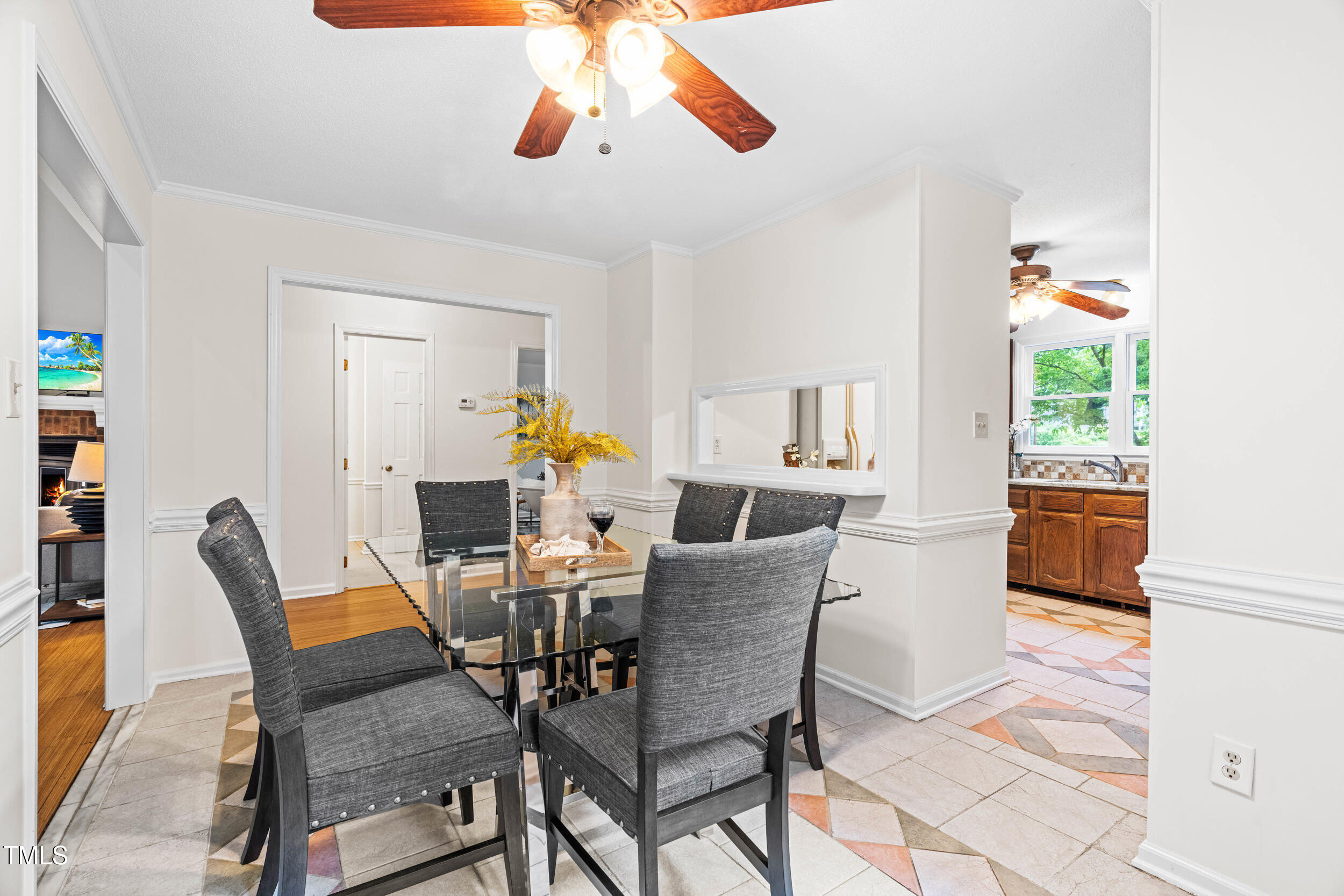 105 Firewood Circle Raleigh, NC 27607 - Photo 13 of 50 a dining room with furniture and wooden floor