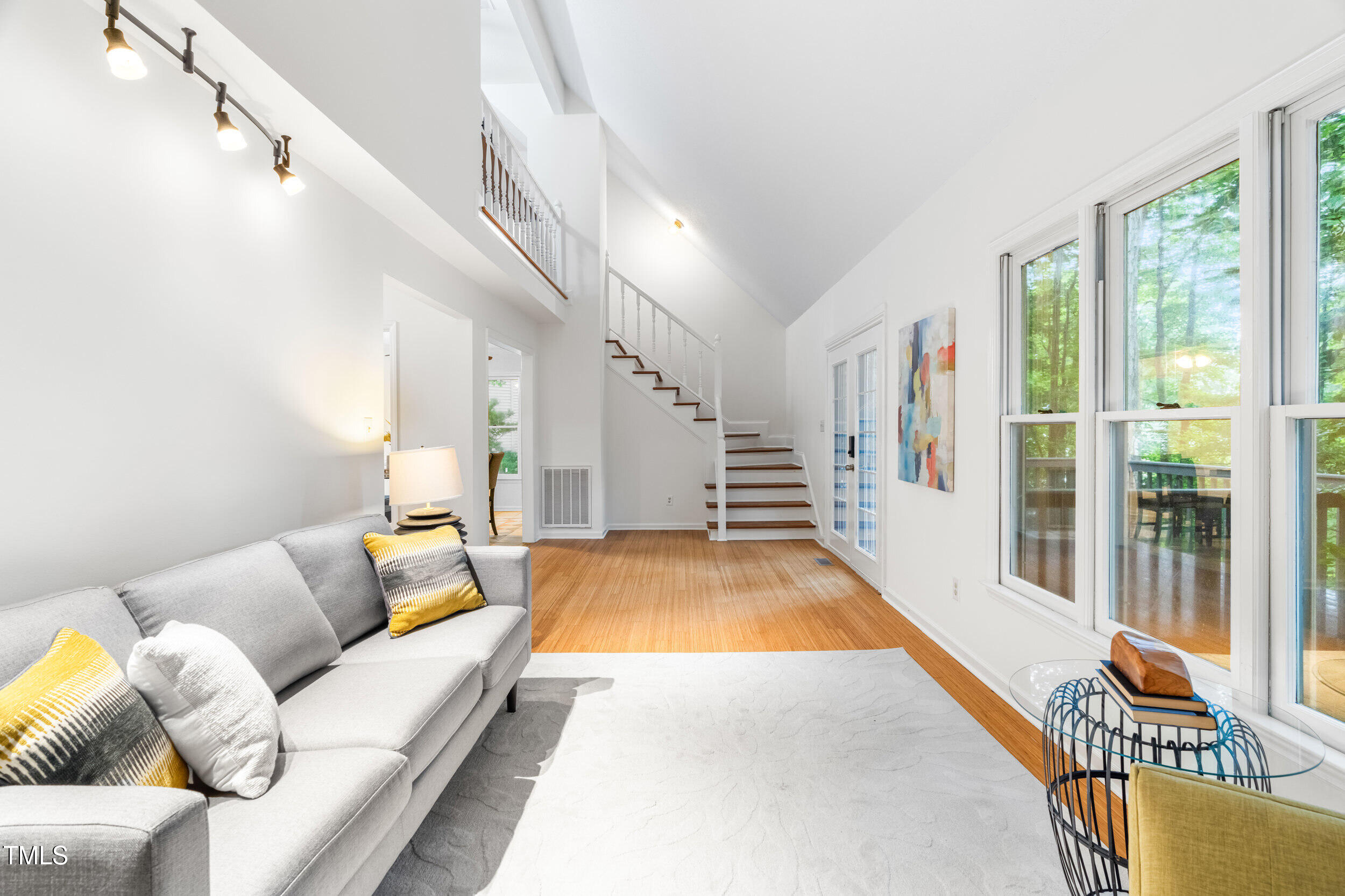 105 Firewood Circle Raleigh, NC 27607 - Photo 21 of 50 a living room with furniture and a large window