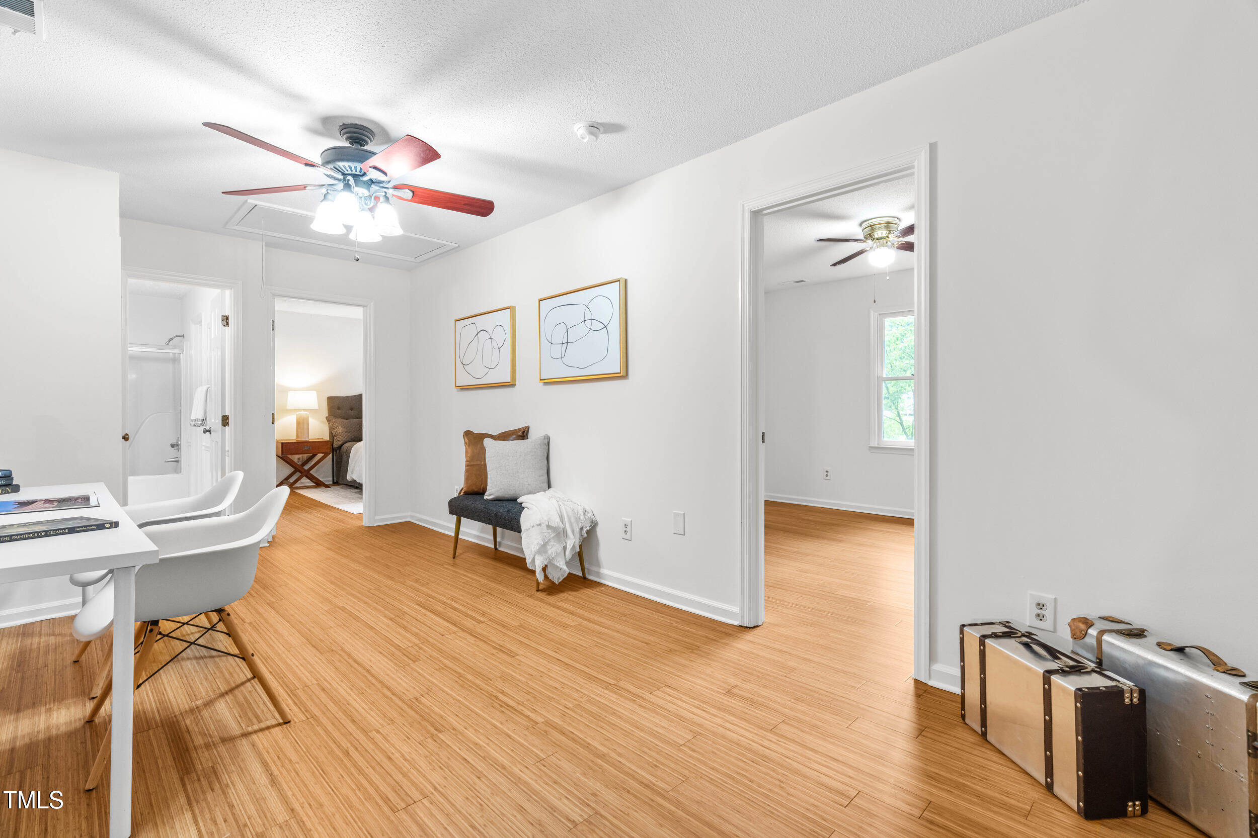 105 Firewood Circle Raleigh, NC 27607 - Photo 22 of 50 a living room with furniture and a wooden floor