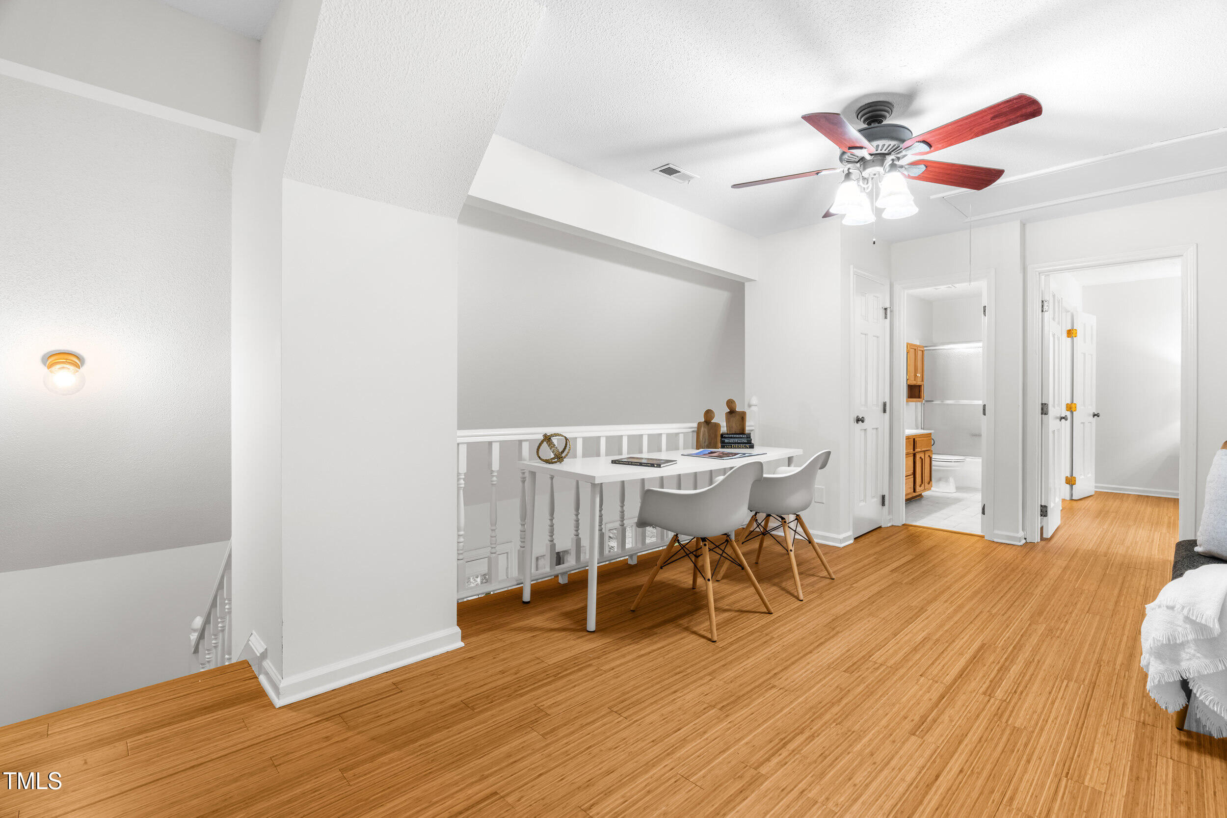 105 Firewood Circle Raleigh, NC 27607 - Photo 23 of 50 a view of a livingroom with furniture and wooden floor