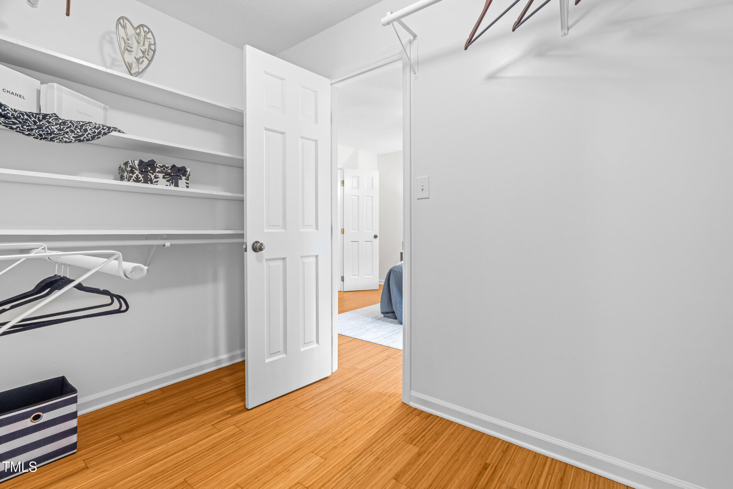 105 Firewood Circle Raleigh, NC 27607 - Photo 29 of 50 a view of an empty room with wooden floor