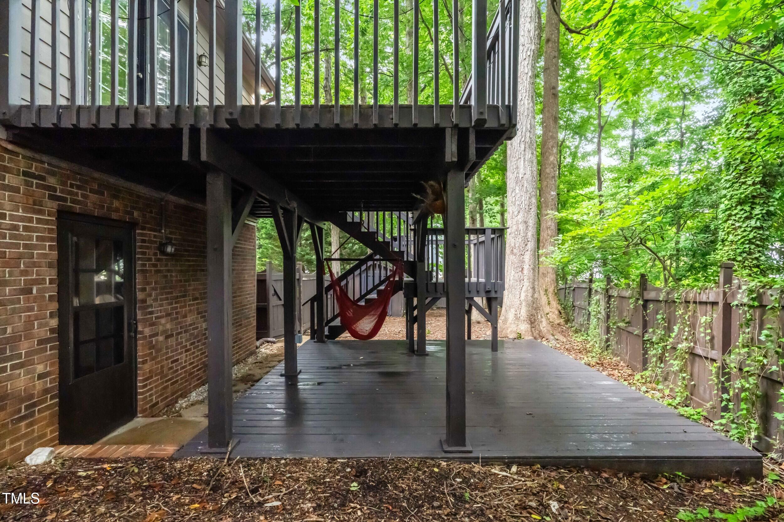 105 Firewood Circle Raleigh, NC 27607 - Photo 46 of 50 a view of a porch with wooden floor