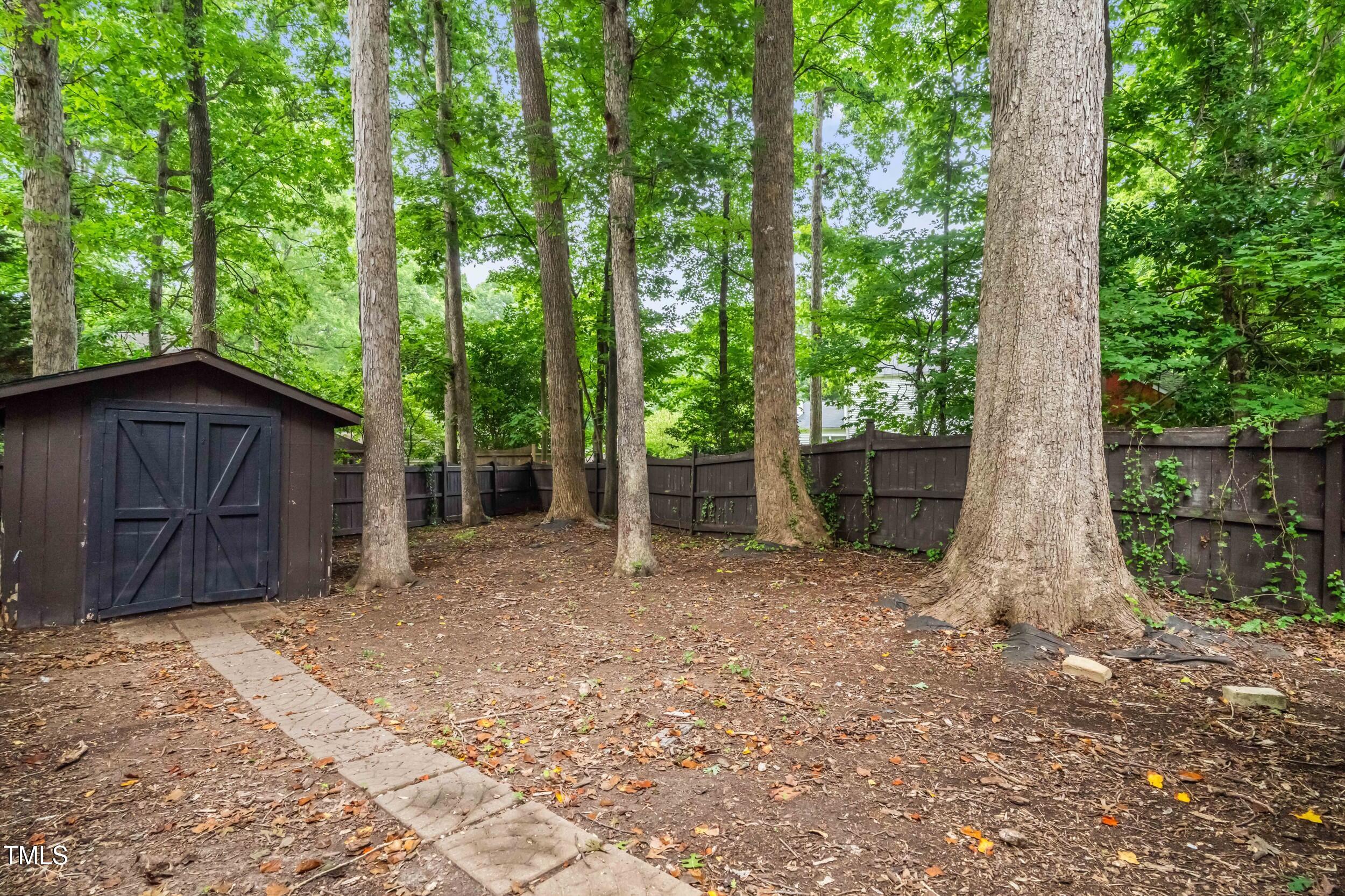 105 Firewood Circle Raleigh, NC 27607 - Photo 48 of 50 a view of a house with a backyard