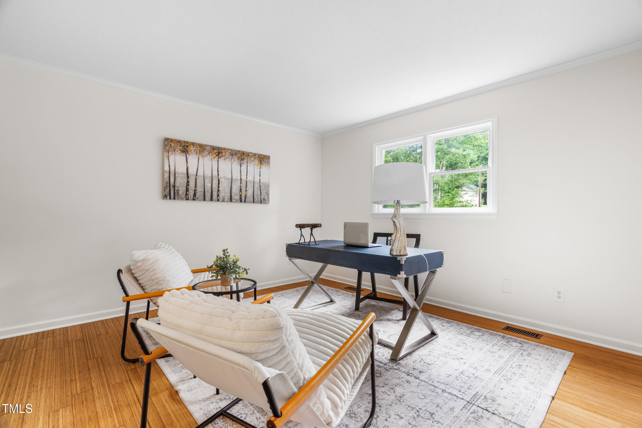 105 Firewood Circle Raleigh, NC 27607 - Photo 8 of 50 a work room with furniture and a window