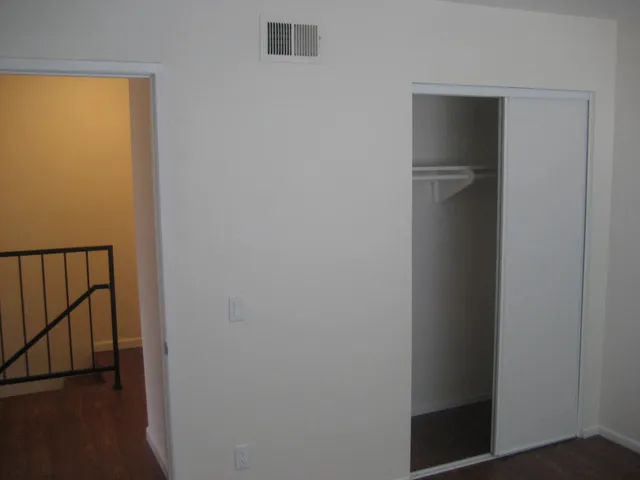 a view of a swimming pool with a chairs