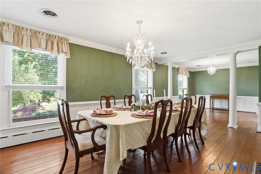 13300 West Patrick Henry Road Doswell, VA 23047 - Photo 7 of 69 Dining area featuring wood-finish flooring, two la
