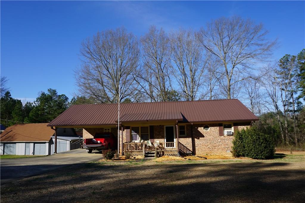 757 Old Bremen Road Bremen, GA 30110 - Photo 1 of 1 a front view of a building with street