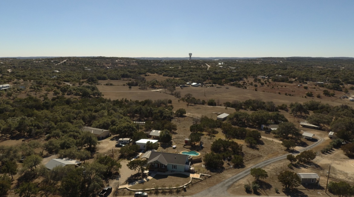 1111 B Harmon Hills Road Dripping Springs, TX 78620 - Photo 1 of 1 an aerial view of multiple house