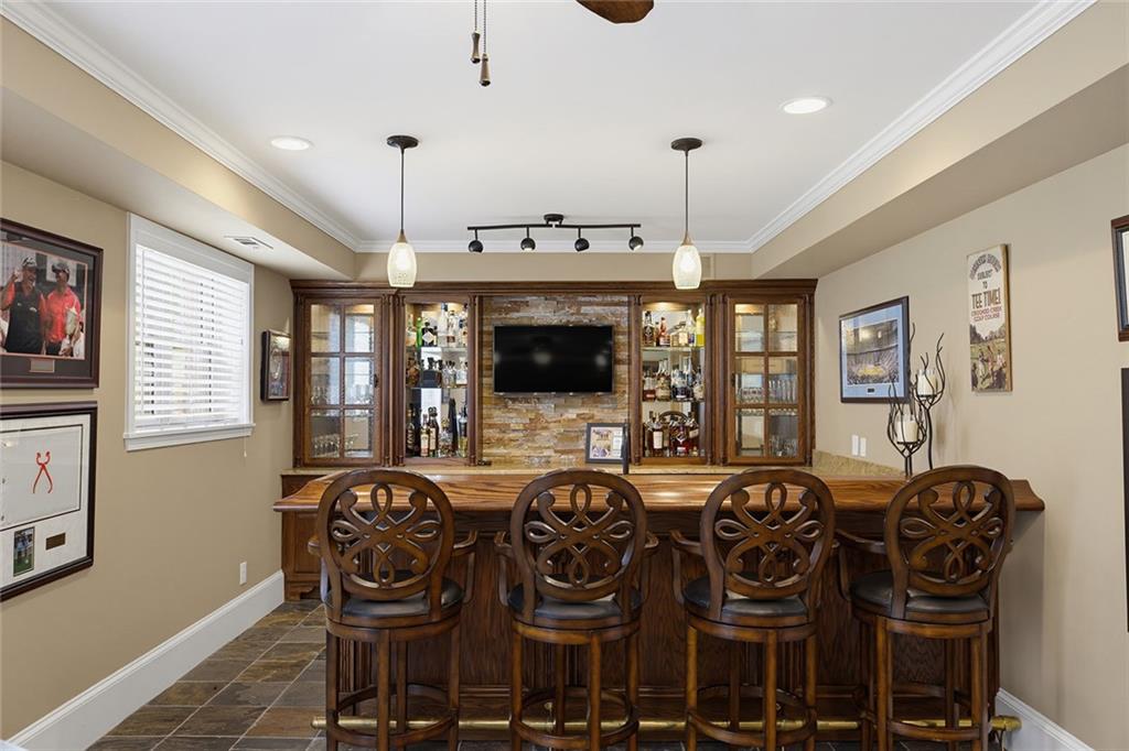14442 Club Circle Milton, GA 30004 - Photo 52 of 82 a view of a dining room with furniture