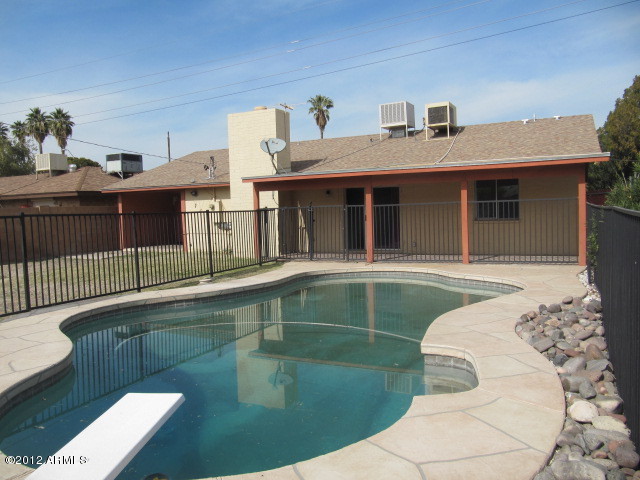 807 West Thomas Road Phoenix, AZ 85013 - Photo 17 of 20 pool with rear view of home