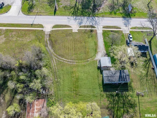 a aerial view of a house with a garden