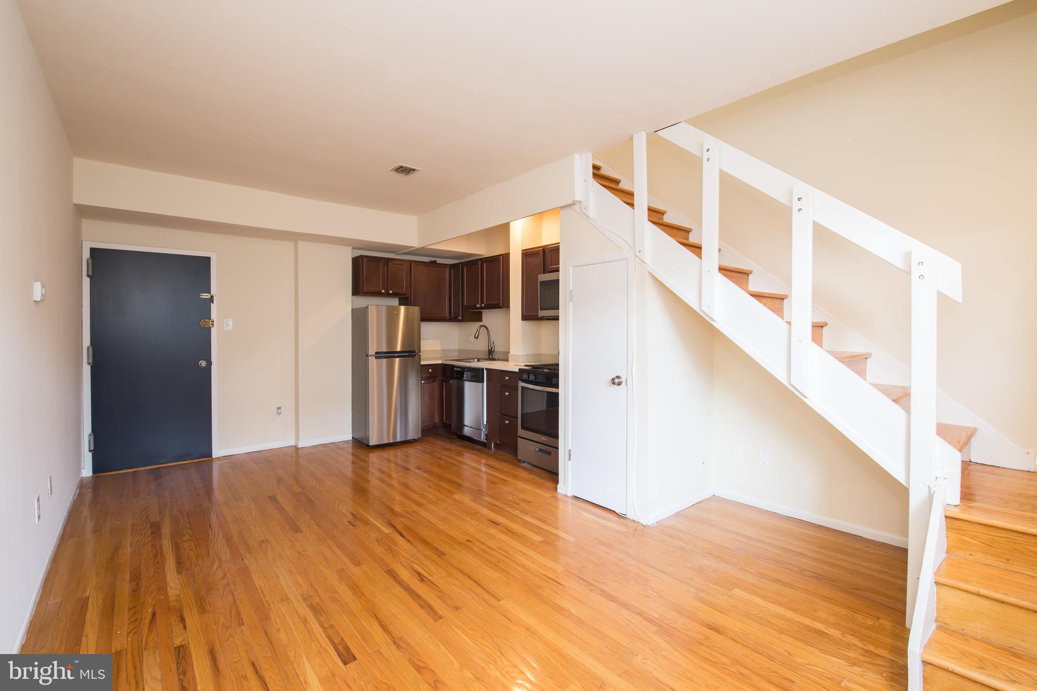 319 South 10th Street, Unit 335 Philadelphia, PA 19107 - Photo 4 of 13 Living/Dining/Kitchen Area