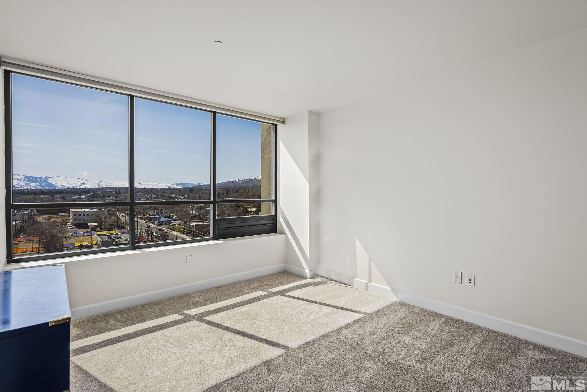 450 North Arlington Avenue, Unit 1207 Reno, NV 89503 - Photo 12 of 22 a view of a living room with a sink