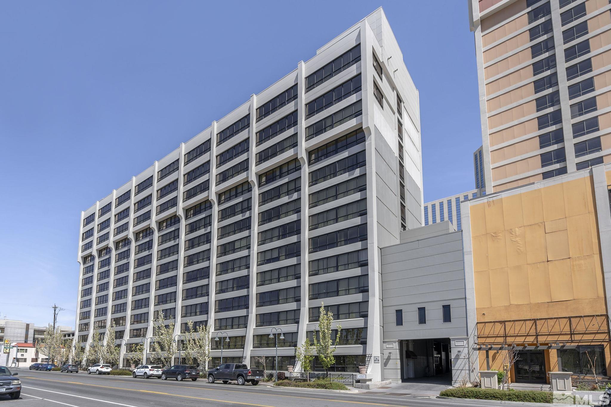 450 North Arlington Avenue, Unit 1207 Reno, NV 89503 - Photo 18 of 22 a view of tall building with a yard