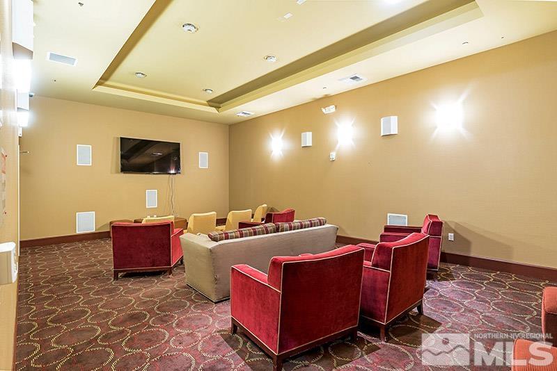 450 North Arlington Avenue, Unit 1207 Reno, NV 89503 - Photo 21 of 22 a living room with furniture and a flat screen tv